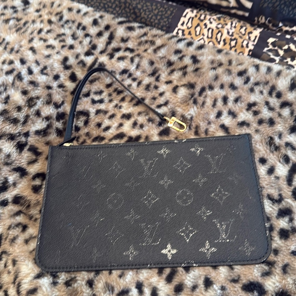 Authentic Louis Vuitton Monogram Empreinte Leather Wristlet